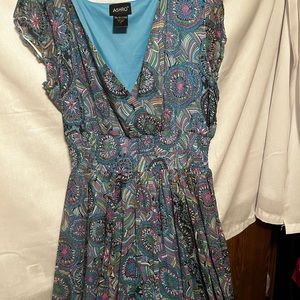 Tea length multi-colored polyester dress.
